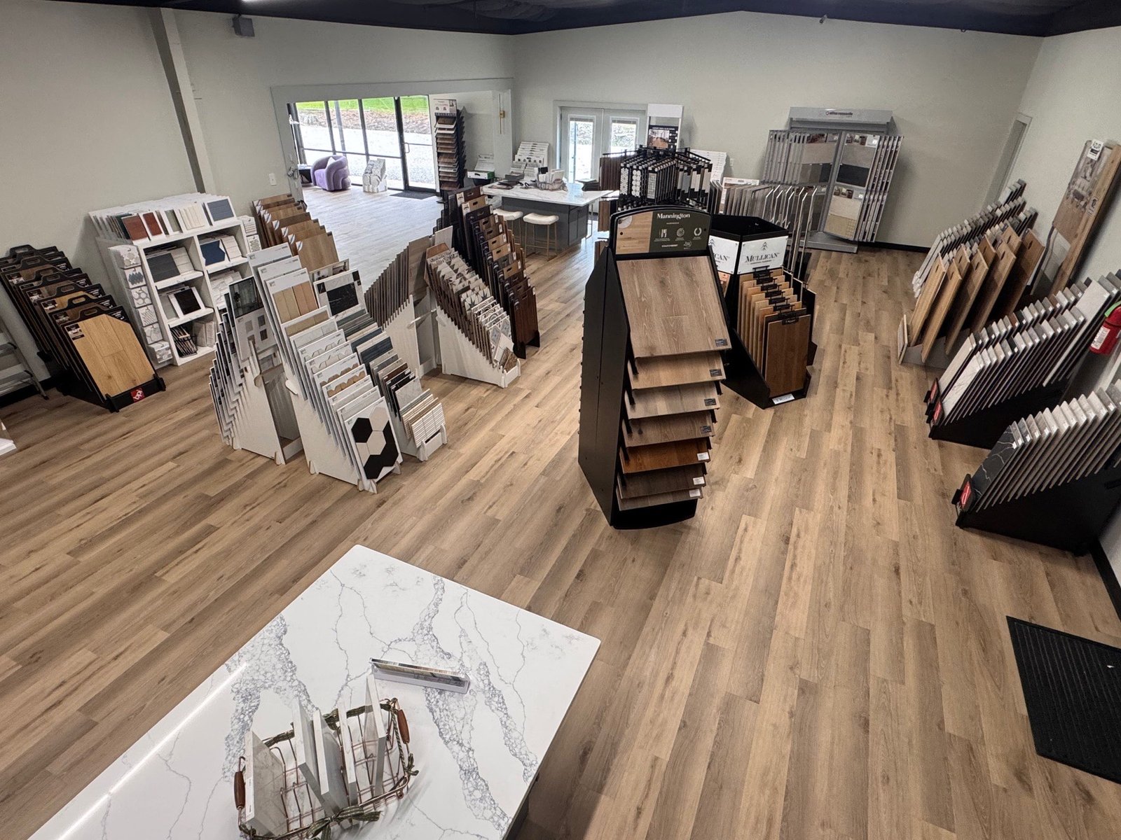 Luxury vinyl plank displays at Luxe Flooring & Stone showroom in Breaux Bridge, LA